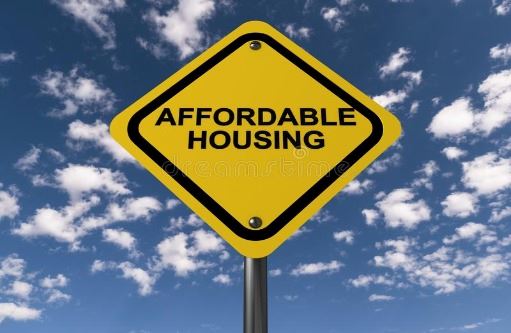 affordable-housing-sign-yellow-sky-background-84737846